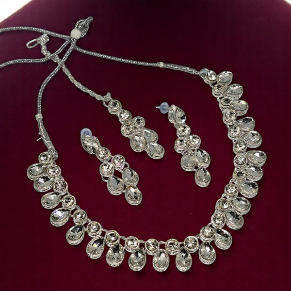 Kundan & Crystal Studded Necklace And Earrings With Maang Tika