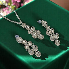 Kundan & Crystal Studded Necklace And Earrings With Maang Tika