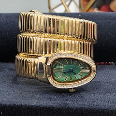 Green Dial Snake-Shaped Quartz Golden Bracelet Watch for Women with Elastic Winding and Oval Dial