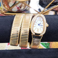 White Dial Snake-Shaped Quartz Golden Bracelet Watch for Women with Elastic Winding and Oval Dial