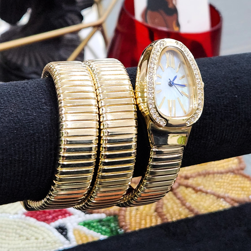 White Dial Snake-Shaped Quartz Golden Bracelet Watch for Women with Elastic Winding and Oval Dial